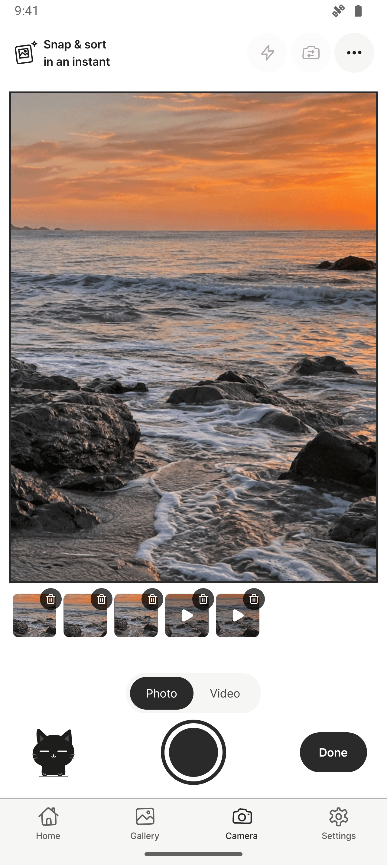PhotoKip camera with a photo preview, captured photos and videos, and shutter controls